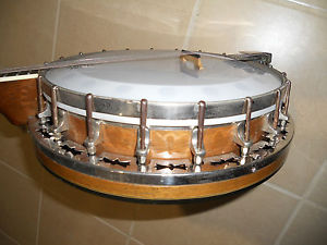 Supertone tenor banjo, 4 string Irish 17 fret, with tone ring and case..1920?