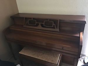 upright piano and bench