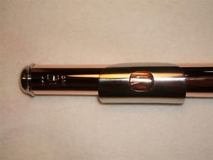 14K gold flute head joint by Lopatin. Stainless steel embouchure and crown.