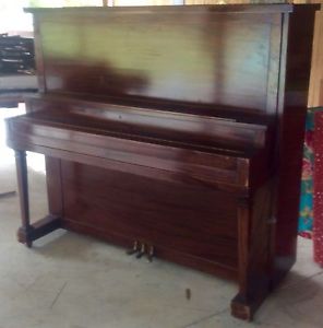 antique upright piano