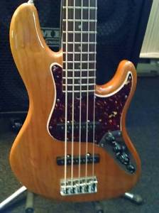 2009 Fender American Deluxe Jazz Bass V - Amber