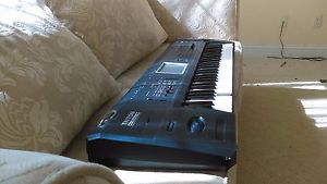 Beautiful used Korg Triton Extreme 61 keyboard for sale in fair condition.