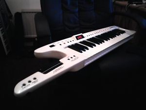 ROLAND AX-7 KEYTAR KEYBOARD SYNTH w/STRAP/ ADAPTER/MANUAL/TURBOSTART!