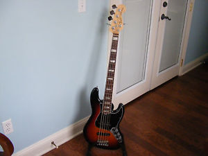 2012  American Standard 5 string Fender deluxe Jazz bass. You'll love it.