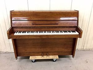 Rogers Modern Upright Piano With A Fiddleback Mahogany Case C.1970