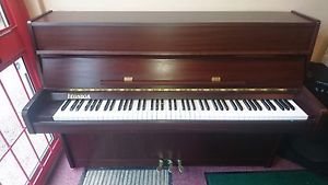 Legnica 1992 overstrung piano and matching stool