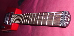 Red Hohner Headless Electric Guitar w/Case & Strap