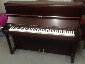 Hopkinson Traditional upright piano in a Mahogany Satin cabinet