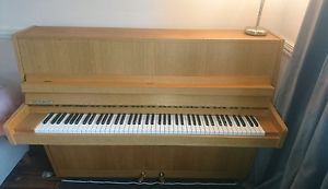 Irsberg overstrung oak cased piano