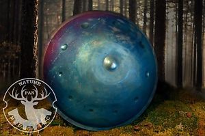New Handpan F-Integral10 scale. Blue sky.