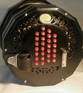 Early Lachenal Edeophone extended treble concertina with glass buttons