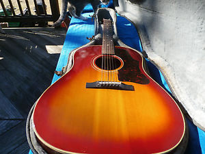 1962 Gibson J-45 ,adjustable bridge, cherry sunburst real nice condition.