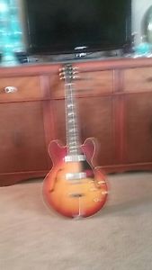 1967 Gibson Electric Guitar. Narrow Neck and is a Cherry Burst. Only serious buy