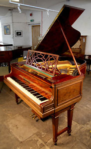 A 1910, Bluthner grand piano. Flame Mahogany. Chippendale Style