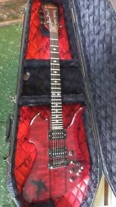 B.C. Rich Mockingbird STQ trans red coffin case + upgraded pups, tuners, elec