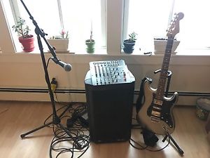 Fender Guitar, peavey power amp, MixPad, and shure SM58 mic with stand setup!