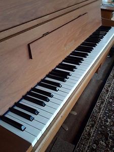 ** 1981 WELMAR UPRIGHT PIANO IN TEAK CASE WITH ADJUSTABLE PADDED STOOL **