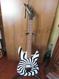 Charvel/Jackson Black on White Buzzsaw guitar with hard shell case