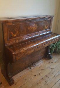 antique upright piano