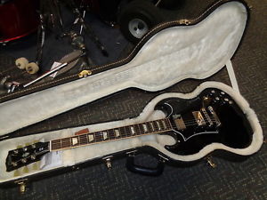 used 2011 Gibson SG Standard black electric guitar with OHSC