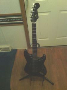 1986 Fender Stratocaster w/ Floyd rose type trem MIJ. This is a Players guitar !