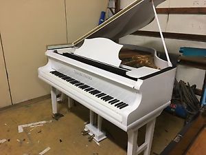 White Baby Grand Piano