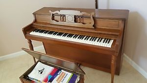 Wurlitzer Console Piano. Custom bench/storage.88 keys.