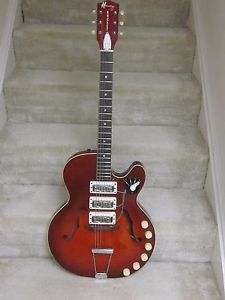 Harmony Rocket-1966, three pickups,red, everything works,great guitar!!!