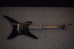 B.C. RICH CHUCK SCHULDINER TRIBUTE ELECTRIC GUITAR WITH LIGHT SCRATCHES.