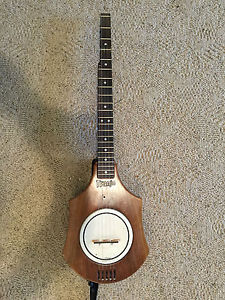 TRANJO Traveling Banjo with Strap. Break it down after playing a breakdown!