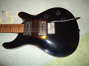 PAUL REED SMITH/PRS. 1993 CUSTOM CE 24,  BUILT IN THE USA. EXCELLENT CONDITION..