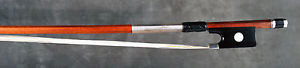 A rare, superb English certified violin bow by John Dodd, ca. 1825.