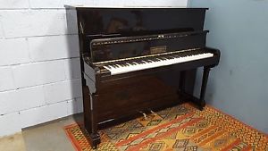 Black, Reconditioned, "Hopkinson" overstrung piano.. WE DELIV ER