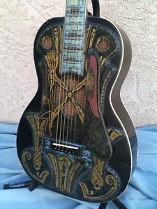 Wow! Quantrell carved, custom body, ebony parlor guitar!