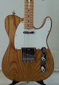 60's style telecaster with tweed hard shell case.