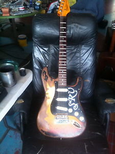 SRV relic fender guitar
