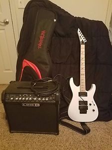 Snow white LTD Deluxe M-1000 used W/ line 6 amp, monster chord and soft case