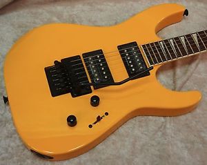Jackson X Series SL3X Soloist electric guitar in taxi cab yellow finish