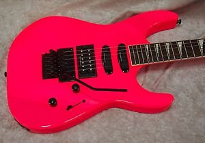 Jackson X Series SL3X Soloist electric guitar in neon pink finish
