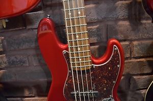 NOS Blemished Fender Jazz Bass Guitar Deluxe Series Candy Apple Red V Pao Ferro