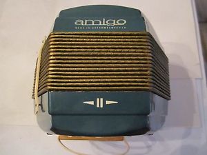 VINTAGE AMIGO ACCORDION MUSICAL INSTRUMENT MADE IN CZECHOSLOVAKIA IN ORIGIN. BOX