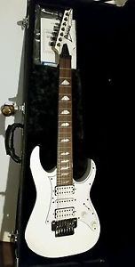 Premium White Steve Vai UV7 guitar with custom carrying case