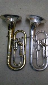 2 USED OLDS BARITONES ONE SILVER ONE GOLD WITH SILVER BELL AND 2 TROMBONE CASES