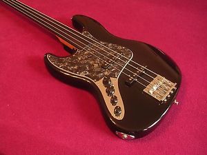 Lefty Warmoth Jazz  Bass  left-handed w/Fender case birdseye maple neck
