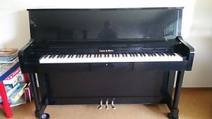 Charles R. Walter 45" ebony upright piano.