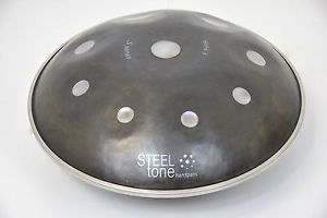 Handpan from Steeltone. 9 note Pelok tuning. None painted finish
