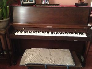 Baldwin Piano  walnut fi excellent conditionc  Purchased from Jacobs music