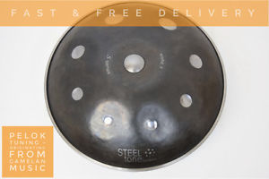 Handpan from Steeltone. 9 note Pelok tuning. None painted finish