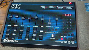 Oberheim DX drum machine w/factory midi. Clean and 100% working.