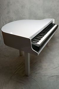 white  baby grand piano shell